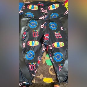 Zumba legging. Brand new with tags. Size medium. Nice prints over black.